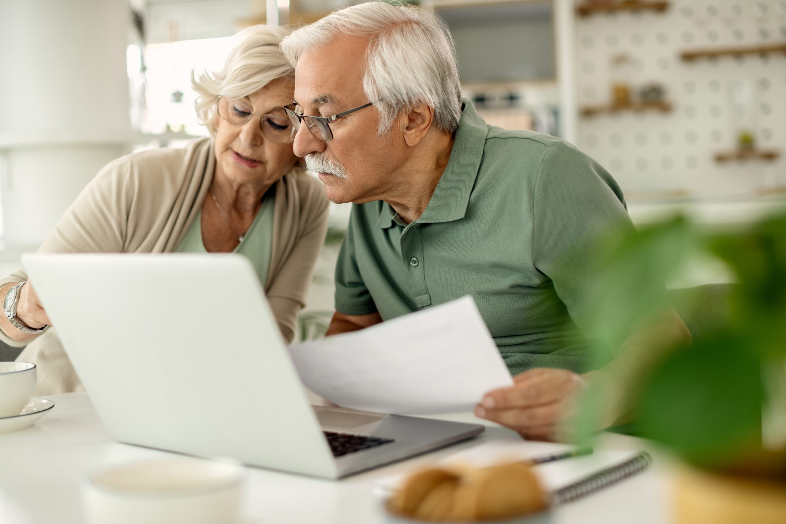 Older couple looking at paperwork